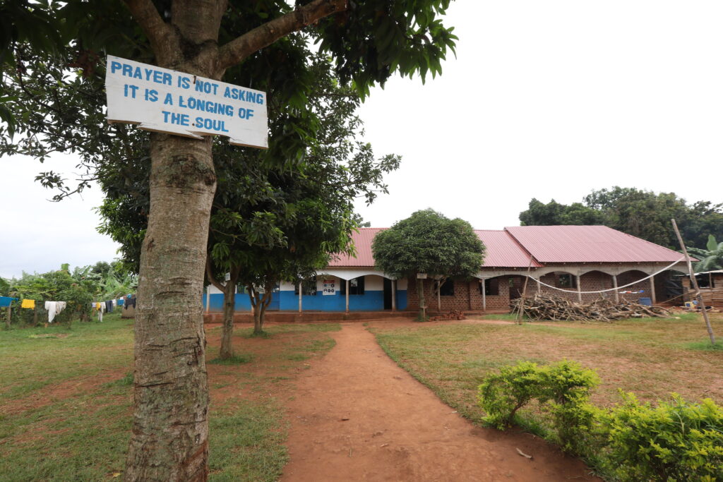 school with a sign in front