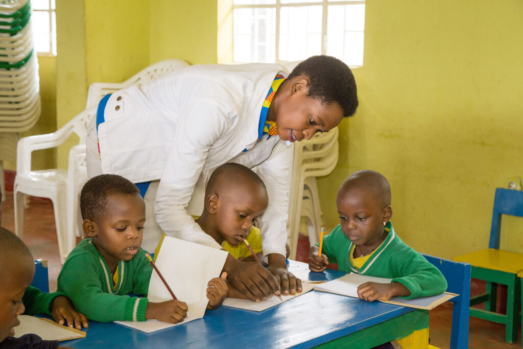 Teacher and students in Rwanda