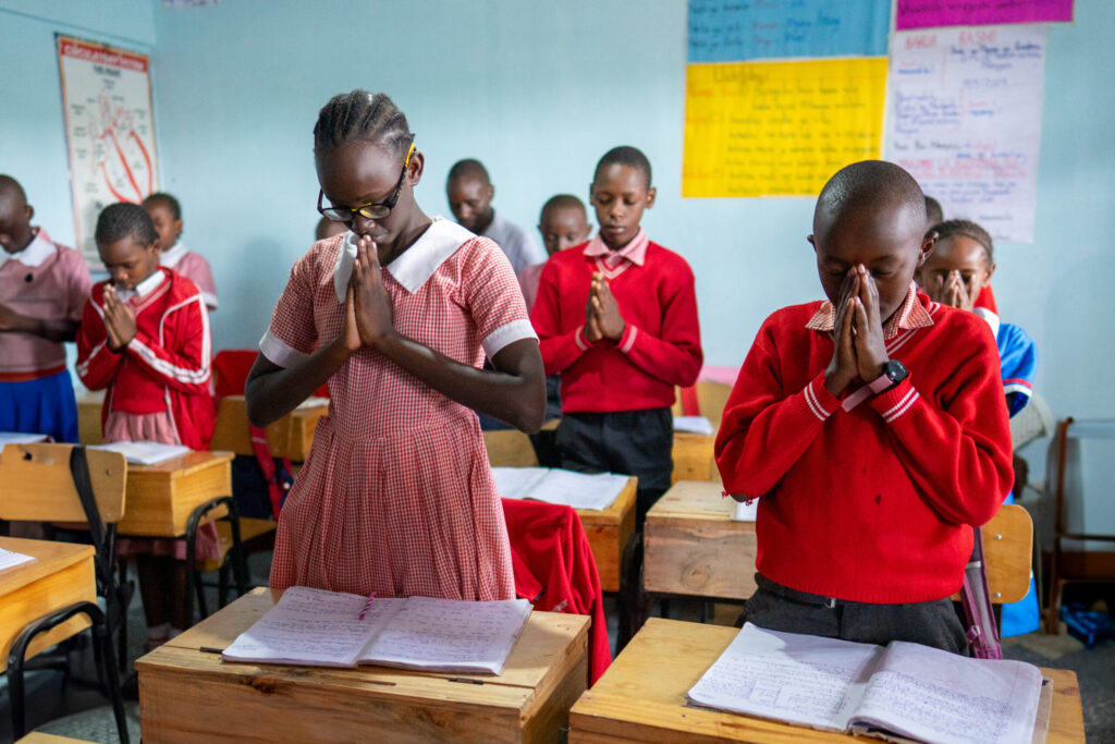 Kenyan students praying