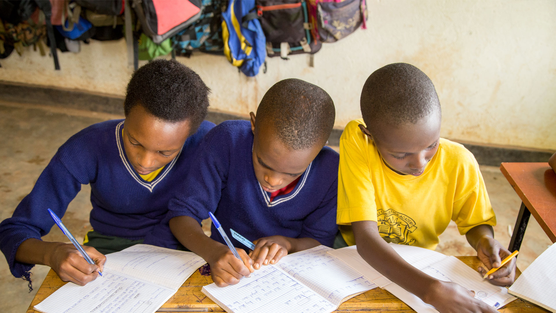 Three students in Rwanda